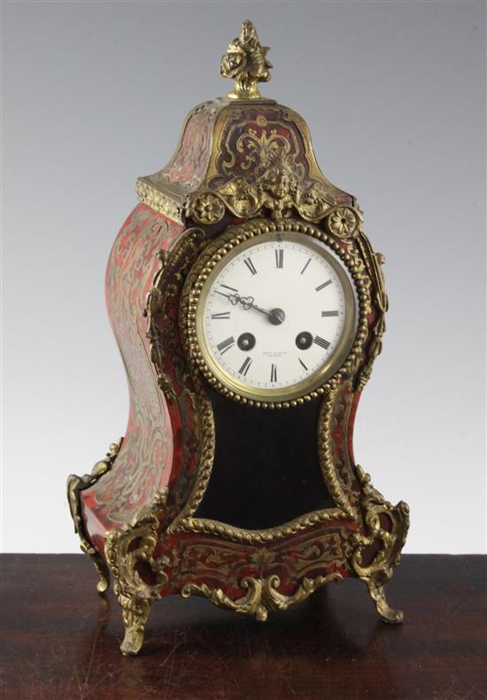 An early 20th century red boulle work mantel clock, 11.75in.